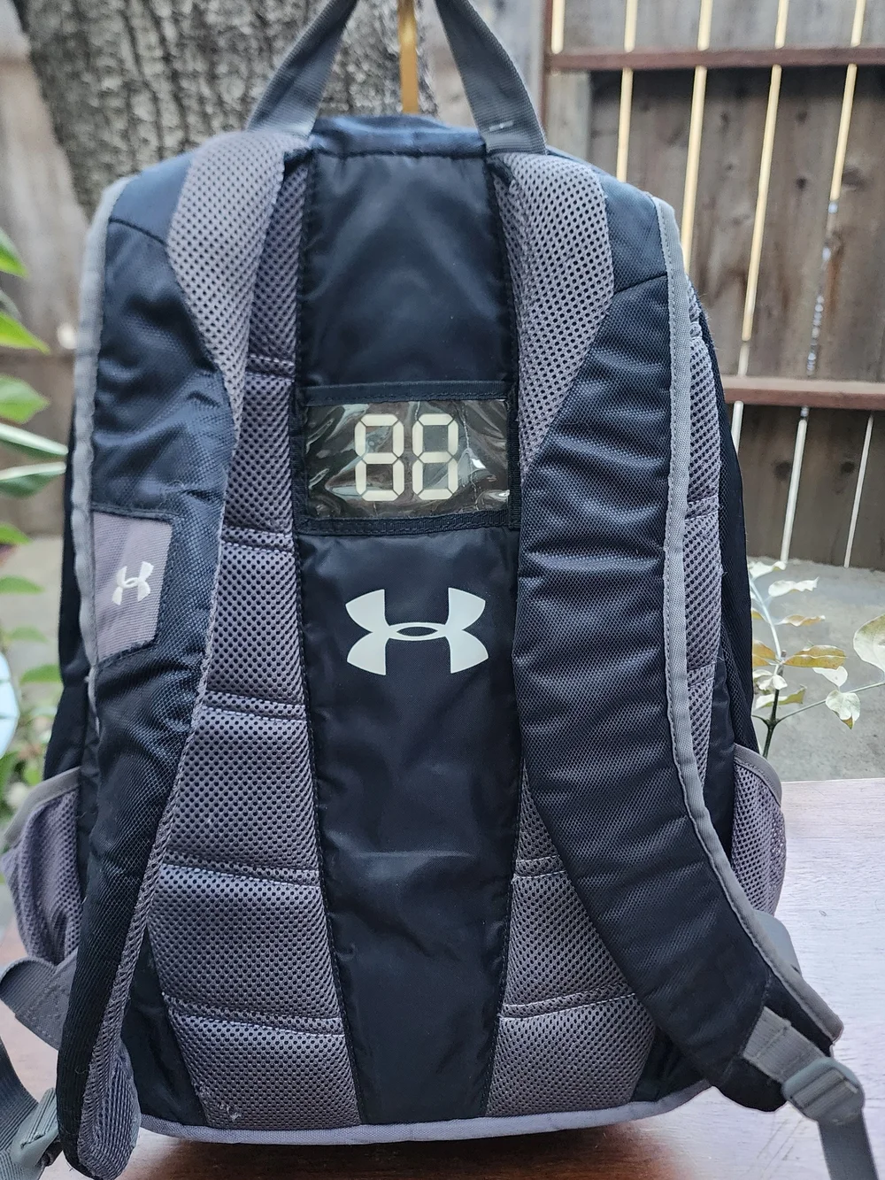 Under Armour Hustle Backpack Black Grey EFT Logo